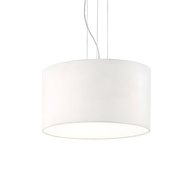 The Marquise 5 Light Pendant - White is a modern, minimalist pendant lamp featuring a cylindrical shade that reflects contemporary design. It is suspended from the ceiling with adjustable steel cables, providing a sleek and clean aesthetic while distributing soft, even light throughout the room.