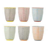 Carla Cup handleless stoneware cups in six assorted colourways, each with a fine grid and dot pattern and a contrasting base rim, shown on a white background.