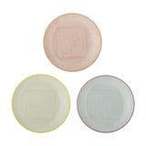 Carla Dinner Plate in three ceramic designs with coloured rims (orange, yellow, red) and grid-dot patterns, shown together on a plain white background.