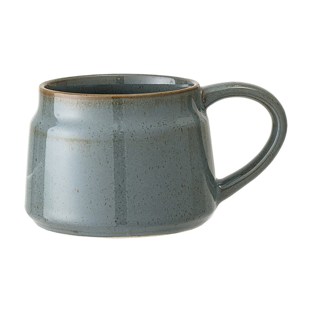 Pixie Stoneware Cup 350ml in green, a wide low mug with a speckled glossy glaze and open loop handle, shown on a plain white background.
