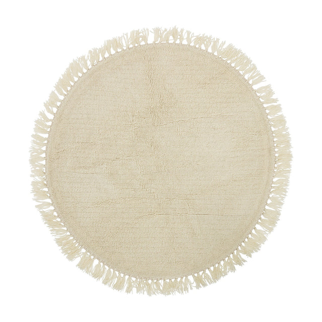 Lenea Round Wool Rug 110cm in Natural, a round wool rug with a dense nubbly pile and looped fringe trim around the edge, shown on a plain white background.