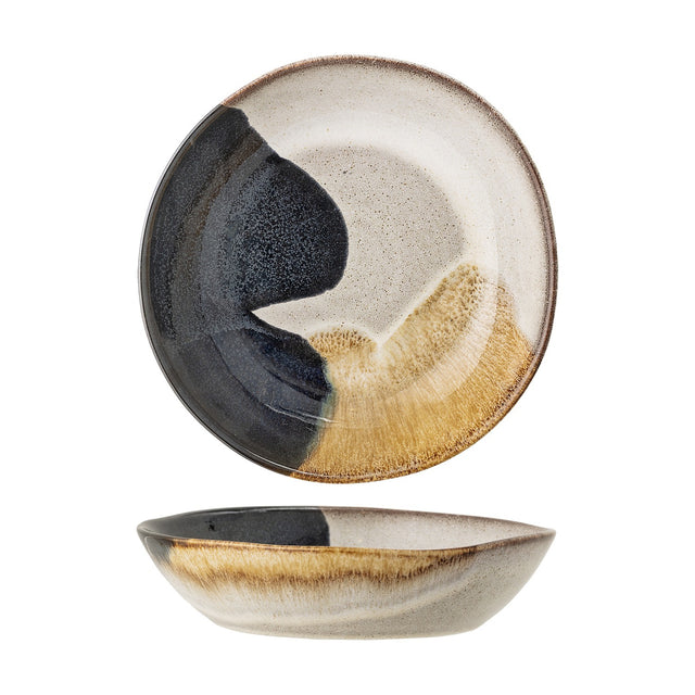 Jules Stoneware Deep Plate in Multi, shown from front and side views with a reactive glaze in black, beige, and white tones on a ceramic finish, against a plain white background.