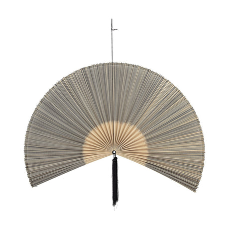 Grey fan-shaped Jaime Bamboo Wall Decor with tightly packed canes radiating from a center pivot, fading to natural bamboo with a black tassel, on a white background.