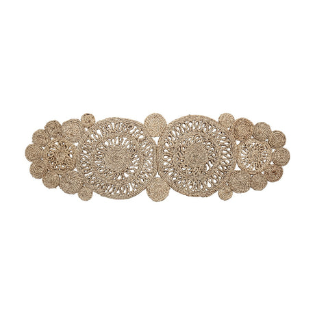Valder Jute Table Runner in natural braided jute, featuring two large openwork spiral rings flanked by clusters of smaller coils with a scalloped edge, on a plain white background.
