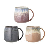 Cloe Speckled Stoneware Mugs, set of three 400ml ceramic mugs with handles in mauve, grey, and tan reactive glazes with drip detailing, shown on a white background.