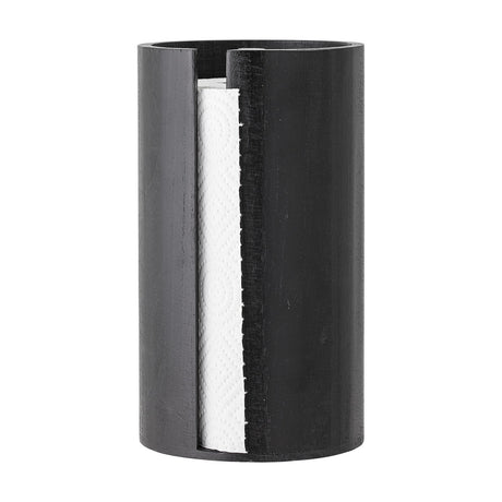 Celian Wooden Kitchen Roll Holder in black paulownia wood, tall cylindrical shape with a front slot showing kitchen paper inside, shown on a white background.