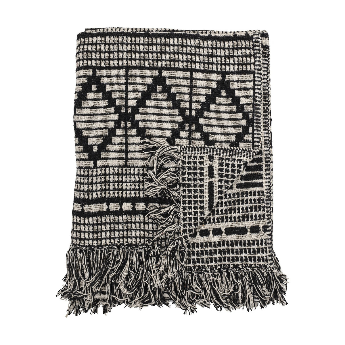 Gutte Geometric Throw in black and cream, woven with diamond and checked patterns, finished with thick fringe edges, folded against a plain white background.