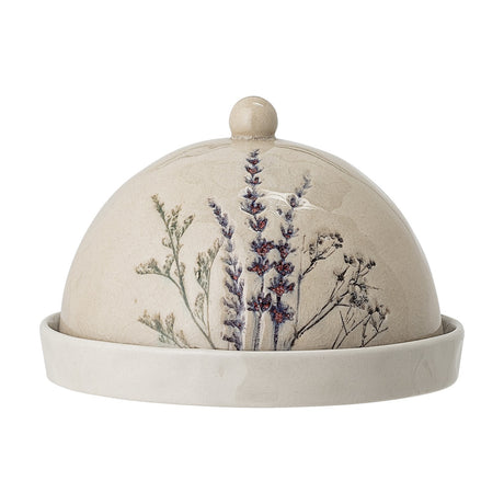 Bea Crackle Stoneware Butter Dish in beige, domed lid with round knob and floral motif over a shallow round base, glossy crackle finish, shown on a white background.