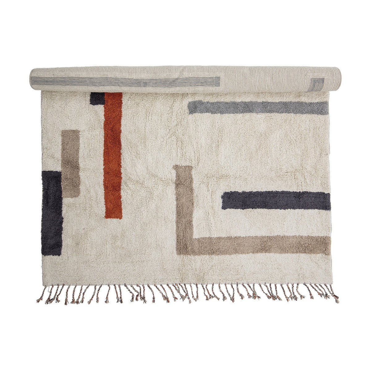 Jue Geometric Cotton Rug, 200x140cm, partially rolled to show a multicoloured geometric pattern of bars and L-shaped lines with knotted fringing, on a white background.