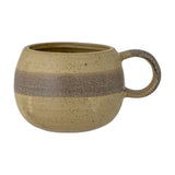Solange Stoneware Mug 350ml in green, a rounded stoneware mug with a speckled glaze, brown mid-band, and loop handle, shown on a plain white background.