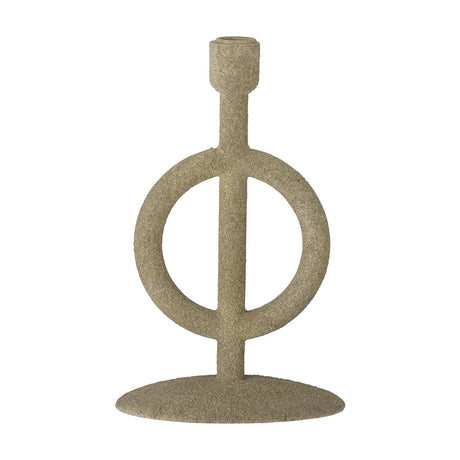 Flikka Resin Candle Holder in beige, a tall single taper holder with a slim stem through an open ring on an oval base, speckled texture, shown on a plain white background.