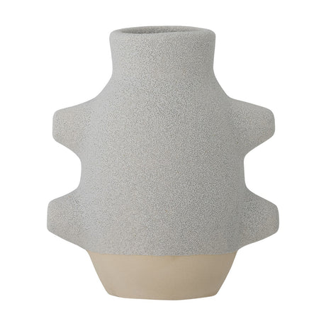 Birka Ceramic Vase 16cm in grey, a small textured ceramic vase with a narrow neck, cog-like stepped sides, and a plain sand-coloured base, shown on a white background.