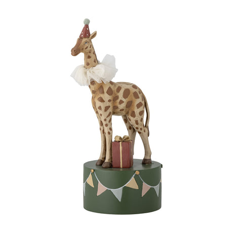 Flor 25cm Resin Candle Holder: polyresin giraffe in a party hat and ruff beside a gift on a green bunting drum base, with a candle socket on its back, on a white background.