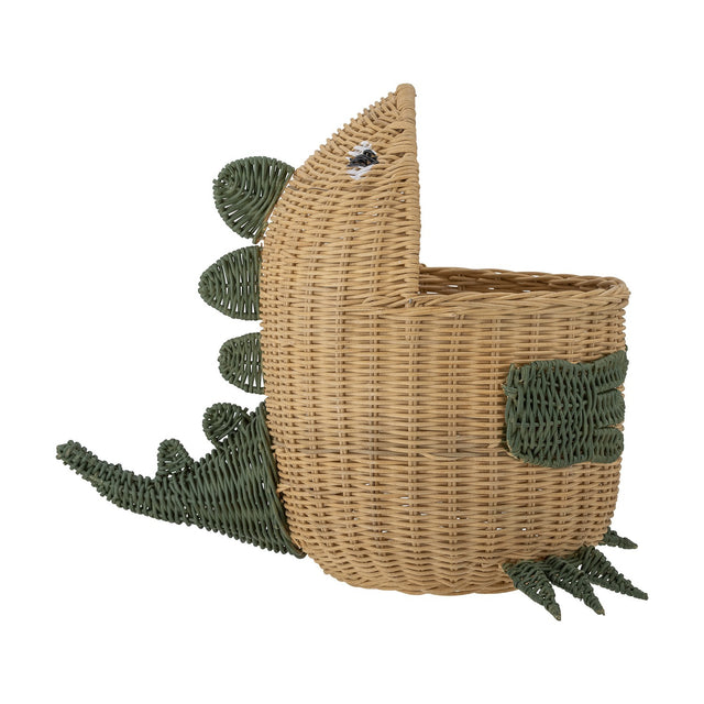 Eddi Dinosaur Rattan Basket in natural woven rattan with green contrasting spines, tail, arm and clawed feet detail, shown on a plain white background.