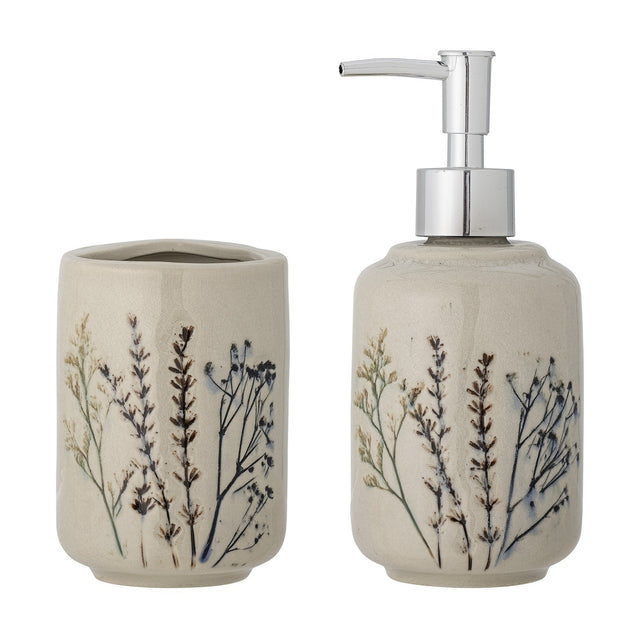 Bea Crackle Stoneware Soap Dispenser Set of 2 in beige, featuring a chrome pump-top dispenser and matching tumbler with floral sprig motifs, shown on a white background.