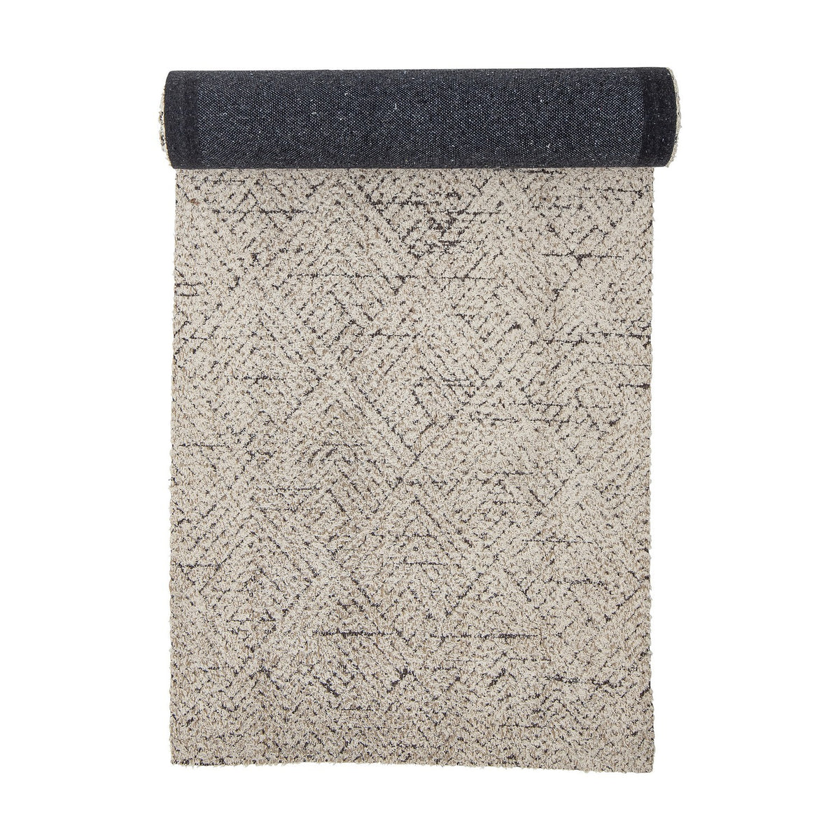 Saxo Cotton Rug 245x75cm runner, natural tone with geometric diamond pattern, shown half-rolled to reveal a dark woven underside, on a white background.