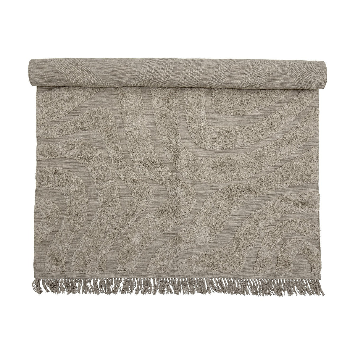Elaine Wavy Cotton Rug 210x150cm in natural, partially rolled to show a tufted wavy pattern on flat-woven cotton with fringed edge, on a plain background.