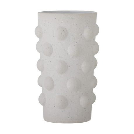 Artan Dotted Stoneware Vase 24.5cm in white, tall cylindrical body with raised dome dots in staggered rows over a speckled matte finish, shown on a plain white background.