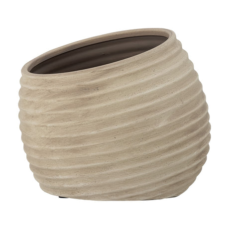 Cimmy Terracotta Plant Pot in beige, a rounded bowl-shaped planter with ribbed horizontal texture and a slanted rim, shown on a plain white background.