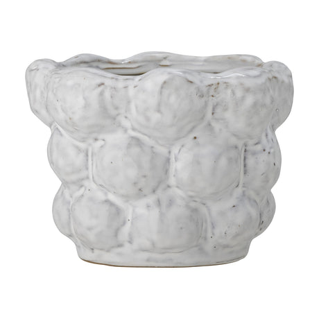Dieter Stoneware Plant Pot in white with a bubbled, pebble-textured surface in three tiers and a soft wavy rim, shown on a plain white background.