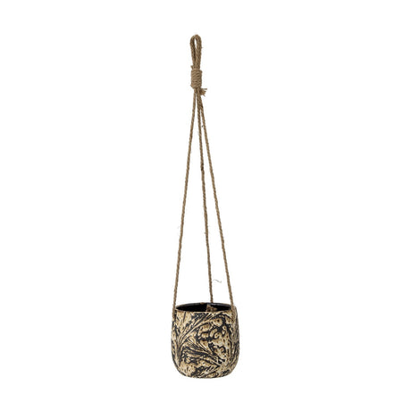 Moghis Stoneware Hanging Plant Pot in black with a hand-painted leafy pattern, rounded tapered body, suspended on knotted hemp cords, shown against a plain white background.