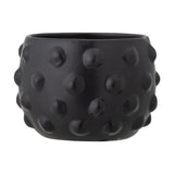 Parvin Terracotta Plant Pot in black, round wide-bodied design with raised dot texture covering the surface, shown on a plain white background.