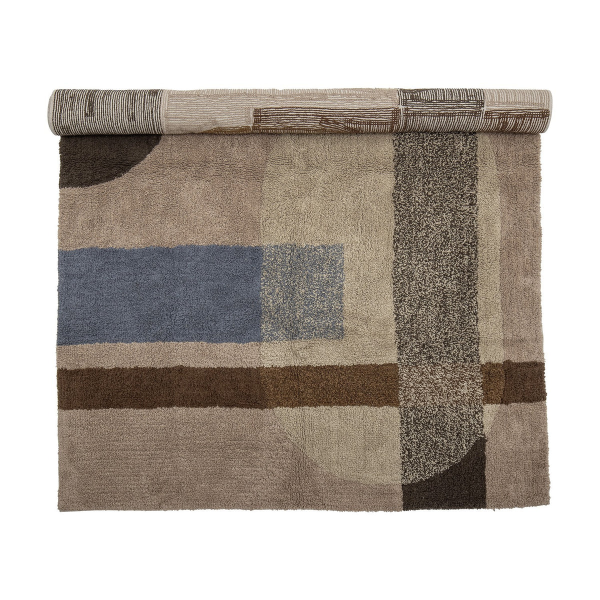 Zofia Geometric Cotton Rug, 200x140cm, partly rolled, showing a tufted beige rug with blue, brown and speckled grey geometric blocks on a plain white background.