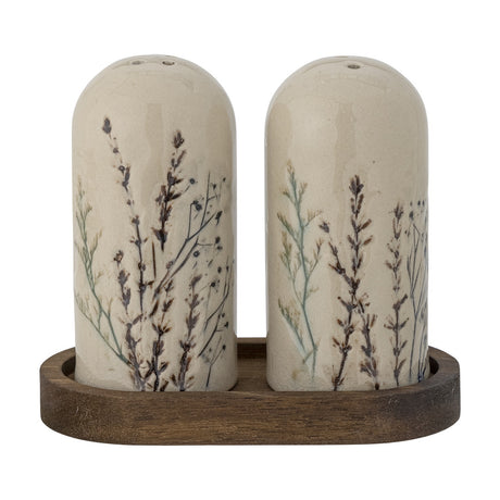 Bea Stoneware Salt & Pepper Shakers Set of 3 in cream, two tall domed ceramic shakers with botanical sprig designs set in an oval acacia wood tray, on a plain white background.