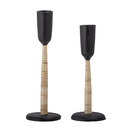 Kesha Iron Candle Holders Set of 2 in black, two heights with narrow cups, rattan-wrapped slim stems, and round flat bases on a white background.