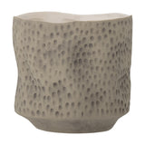Sayah Stoneware Plant Pot in grey with an all-over dimpled texture, uneven wavy rim, and tapered foot, shown against a plain white background.