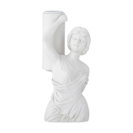 Medea Resin Candle Holder in white, a classical female bust in draped robes with one arm raised to support a tall candle column, set against a plain background.