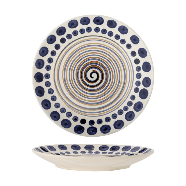 Shama Dotted Stoneware Dinner Plate in white with a hand-painted navy dot border and a spiralling blue-brown centre line, shown front-facing and in profile on a white background.