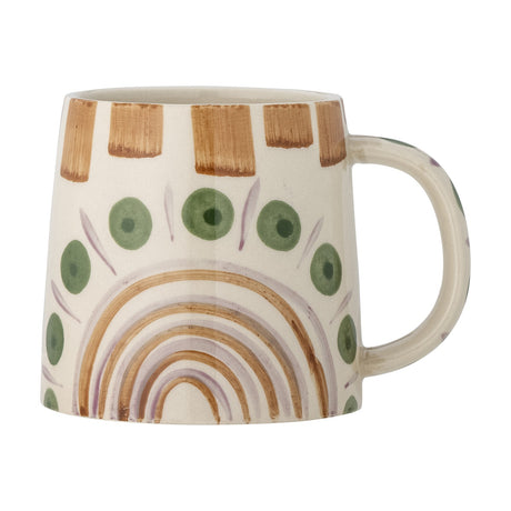 Shama Stoneware Mug 515ml in Multi, a hand-decorated ceramic mug with brown rectangles, green dots, and an arched rainbow motif, rounded handle, on a plain white background.