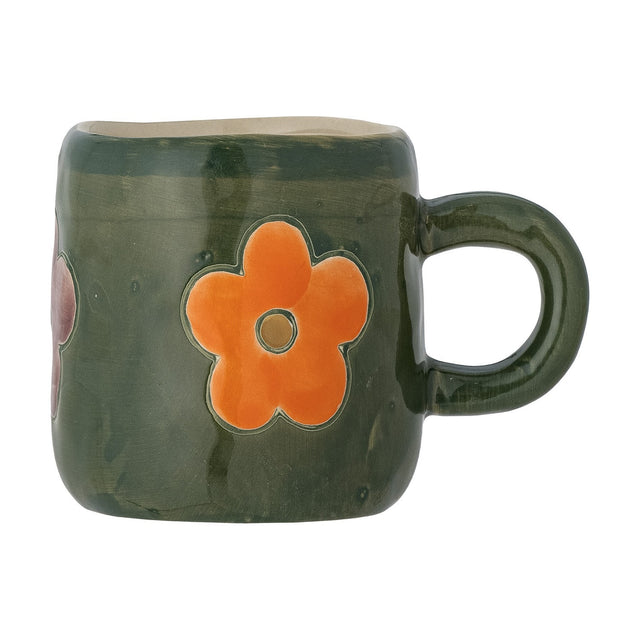Addy Stoneware Cup in green, a small ceramic child's cup with rounded sides, wavy rim and chunky loop handle, decorated with an orange flower motif, shown on a plain white background.