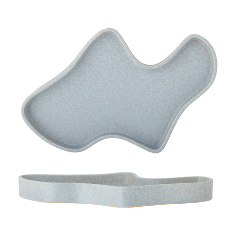 Lakey Stoneware Tray in blue with a freeform, wavy outline and low rim, shown from above and in profile against a plain white background.