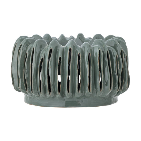 Mavel Stoneware Plant Pot in green, a low wide ceramic planter with vertical slits between ribs and a wavy scalloped rim, shown on a plain white background.