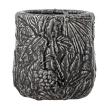 Nikou Terracotta Plant Pot in black, round shape with raised botanical leaf and fruit relief covering the glossy surface, shown on a plain white background.