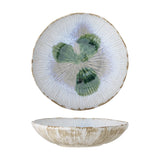 Mati Fluted Stoneware Bowl 29cm in white, shown from top and side, with ribbed fluting radiating from the centre, a green floral motif, and a wavy rim, on a plain white background.