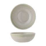 Paula Stoneware Bowl 16cm in cream, shown from above and the side, a shallow ceramic bowl with reactive glaze shading from sage green rim to speckled cream interior, on white background.
