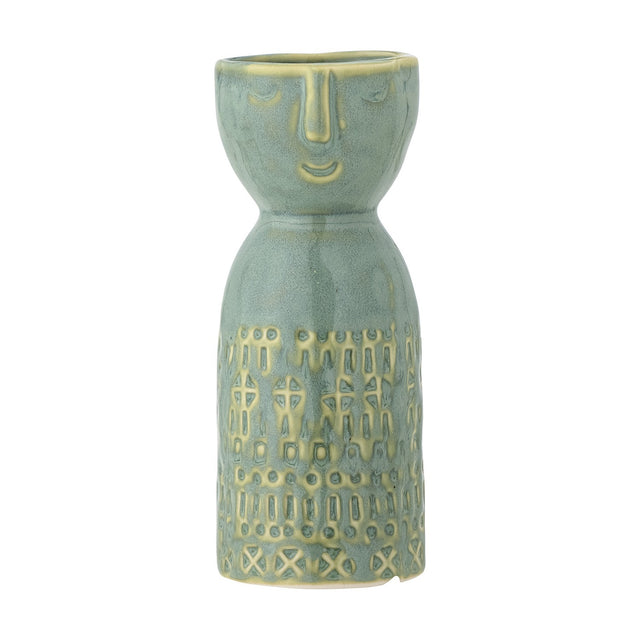 Embla Stoneware Vase 14.5cm in green, a narrow-waisted ceramic vase with a sculpted face below the rim and a raised geometric pattern on the lower body, shown on a plain white background.