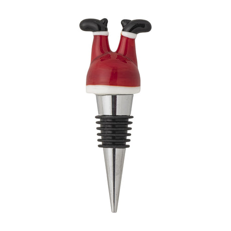 Lynn Glass Christmas wine stopper in red, shaped as Father Christmas's legs with black boots, set on a ribbed silicone and stainless steel cone, shown on a white background.