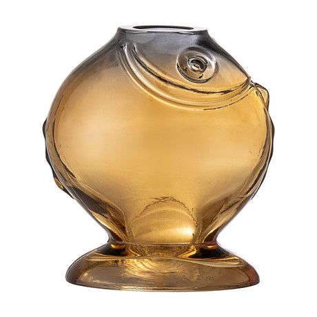 Varga Fish Glass Vase 16cm in amber, a rounded fish-shaped glass vase with a raised eye, gill line and side fins on a flared foot, set against a plain white background.