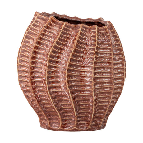 Callon Stoneware Vase 20.5cm in pink, rounded ceramic form with deep ribbed ridges swirling up to a wavy scalloped rim, glossy glaze, shown on a plain white background.