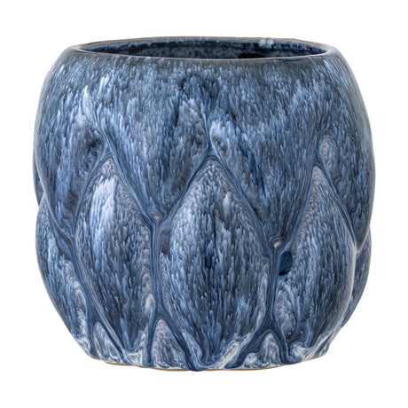 Posey Stoneware Plant Pot in blue, a rounded ceramic planter with sculpted, pointed leaf-like segments and a glossy drip glaze, shown on a plain white background.