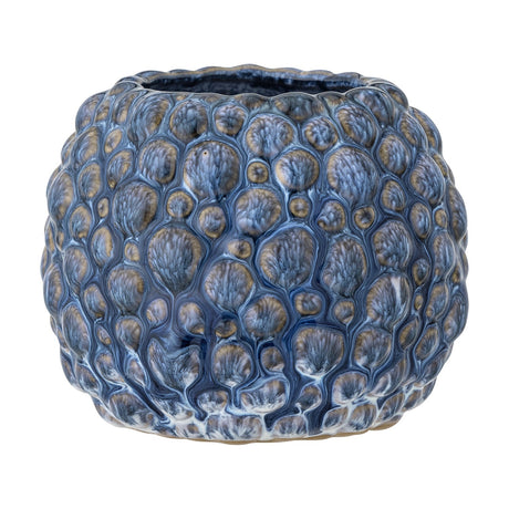 Susannah Stoneware Plant Pot in blue, a small round ceramic planter with a bumpy, pebble-textured surface in varied blue tones, shown on a plain white background.