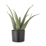 Artificial aloe plant with long, tapering toothed green leaves in a round black pot, shown against a plain white background.