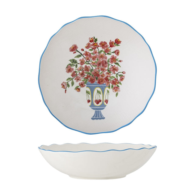 Dorothy 28cm stoneware serving bowl in white, shown both top-down with a scalloped blue-rimmed edge and floral vase design, and in profile, on a plain background.