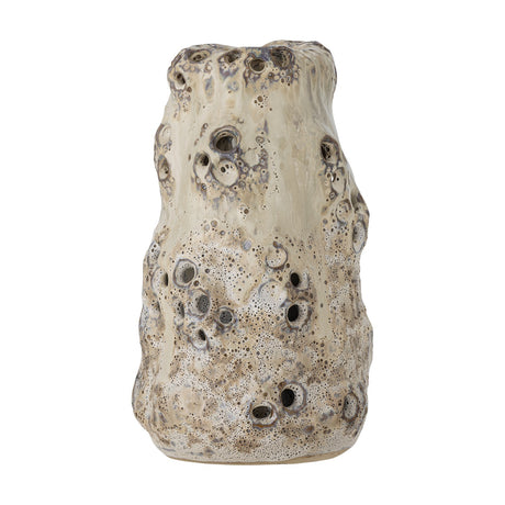 Noble Stoneware Vase 21.5cm in beige, with an uneven, organic form and a pitted, bubbled glaze resembling coral, shown against a plain white background.