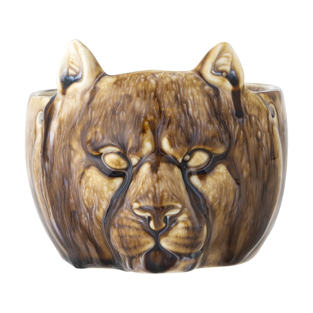 Abner Stoneware Plant Pot in Brown, a small ceramic planter moulded as a big cat's face with pointed ears and relief eyes under a glossy brown glaze, on a white background.
