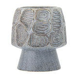 Clarke Stoneware Plant Pot in blue with a wide, rounded bowl on a tapering footed base, featuring textured panels of concentric rings and ridged lines, shown on a plain white background.